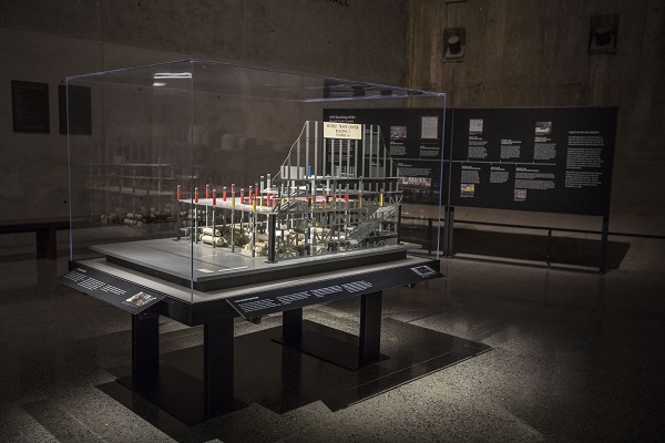 A model of the World Trade Center parking garage is shown encased in display glass on a table at the Museum.