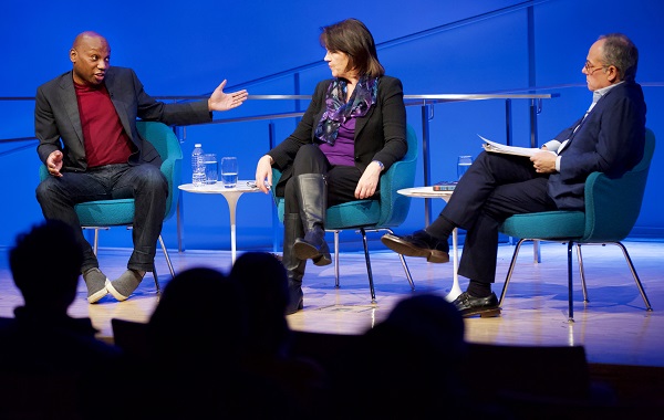 During a public program at the Museum auditorium, sports columnist Howard Bryant and USA Today columnist Christine Brennan talk onstage with Clifford Chanin, the executive vice president and deputy director for museum programs.