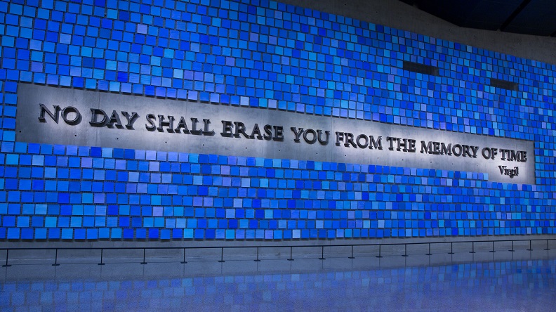 A large plaque in Memorial Hall reads, “No day shall erase you from the memory of time.” The quote from Virgil’s epic poem The Aeneid is surrounded by 2,983 individual blue tiles that comprise "Trying to Remember the Color of the Sky on That September Morning,” an installation by Spencer Finch. Every square is a unique shade of blue, reflecting the artist's attempt to remember the color of the sky on the morning of 9/11 and commemorating the victims of September 11, 2001 and February 26, 1993.