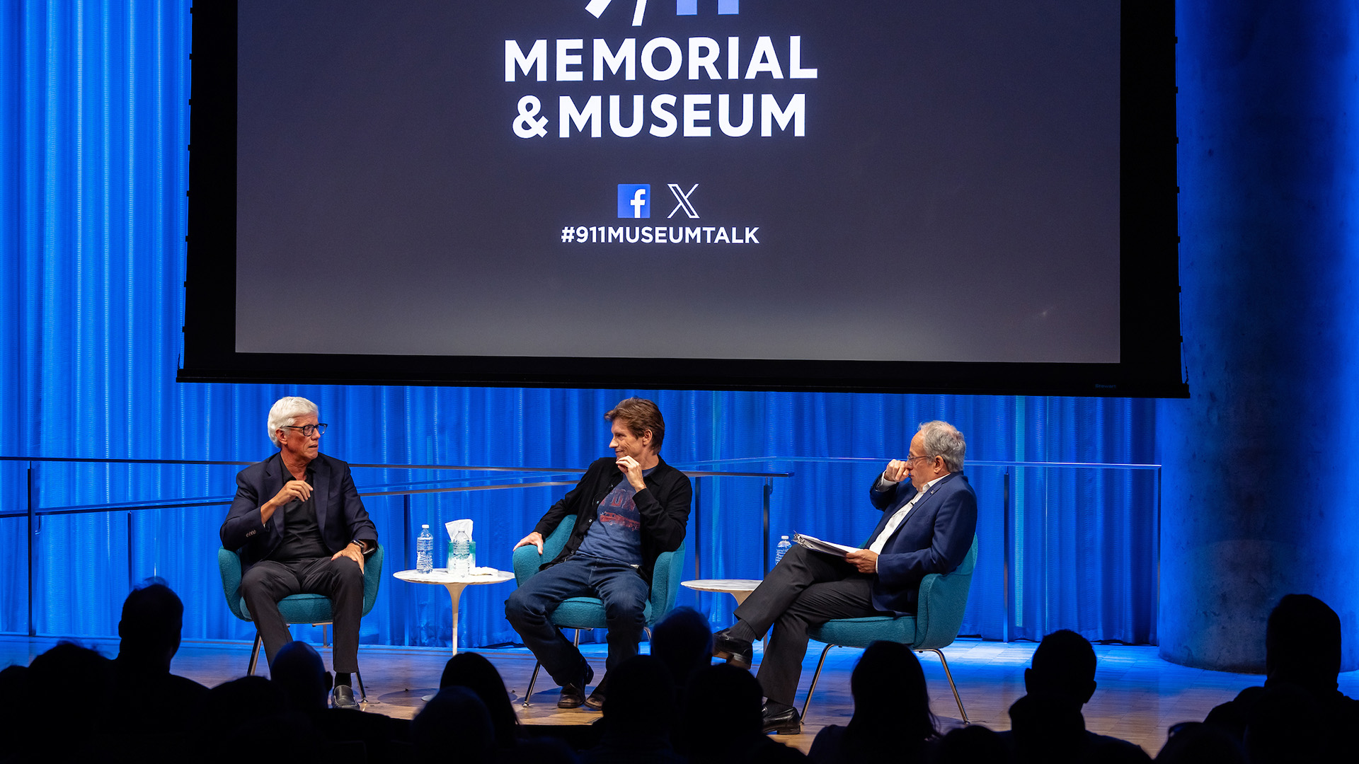 Peter Tolan (left) sitting on stage with Denis Leary (center) and Museum Director Clifford Chanin (right)