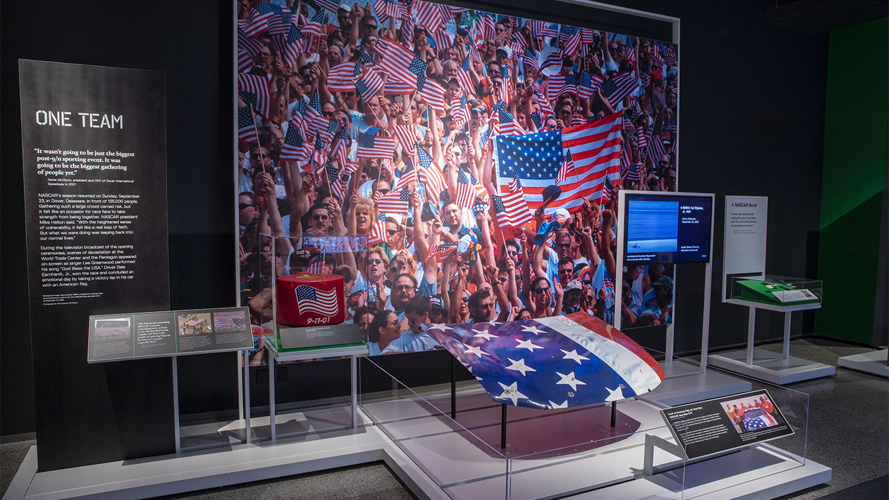 The story behind the massive American flags at sporting events