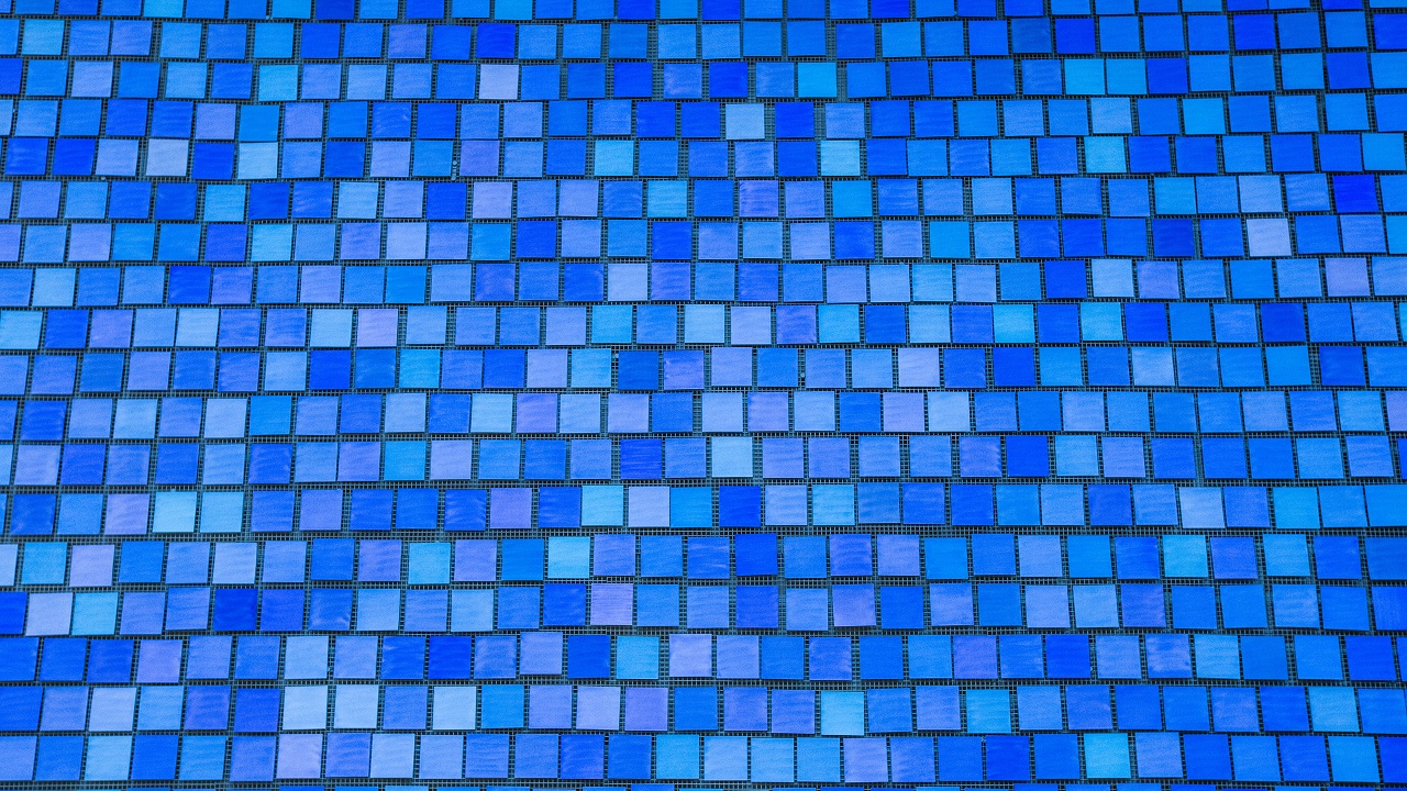 A portion of the 2,983 individual blue tiles that comprise "Trying to Remember the Color of the Sky on That September Morning,” an installation by Spencer Finch. Every square is a unique shade of blue, reflecting the artist's attempt to remember the color of the sky on the morning of 9/11 and commemorating the victims of September 11, 2001 and February 26, 1993.