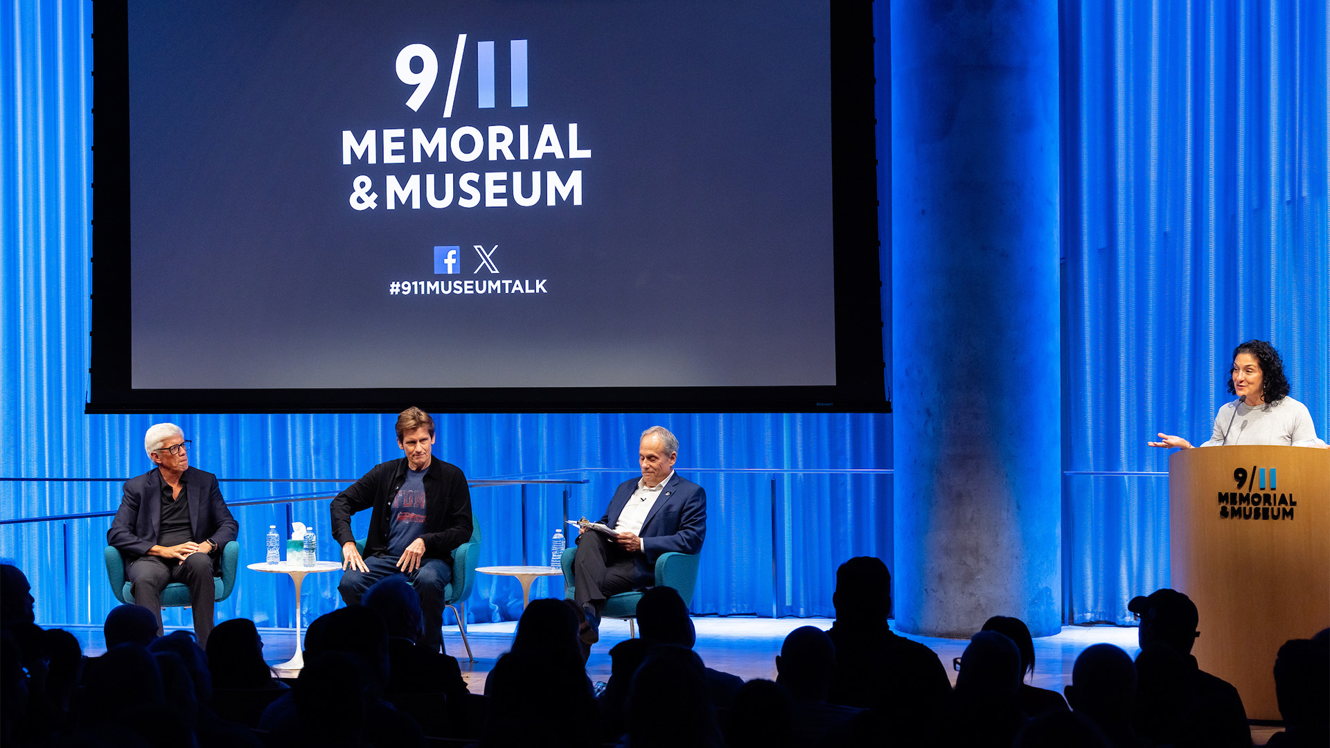 Peter Tolan (left) sitting on stage with Dennis Leary (center) and Museum Director Clifford Chanin (right)