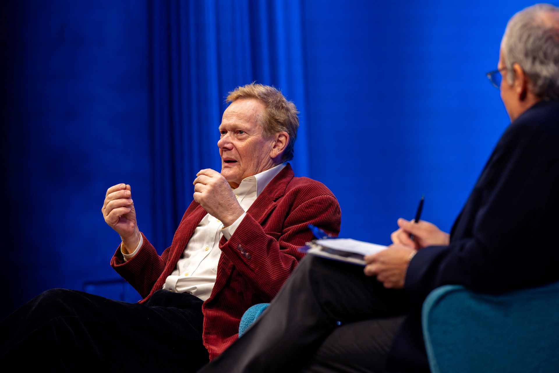 Closeup of Philippe Petit talking and gesturing