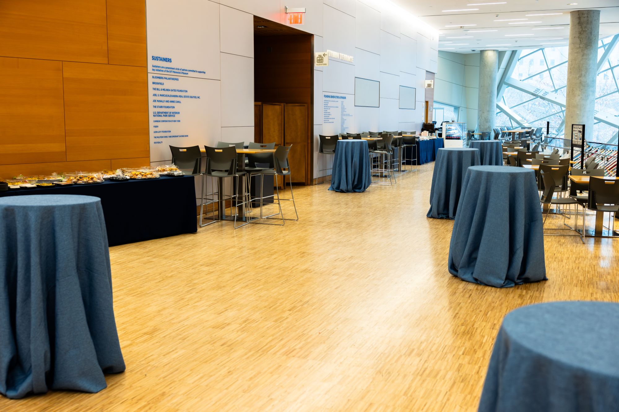 blue tables on a light yellow floor