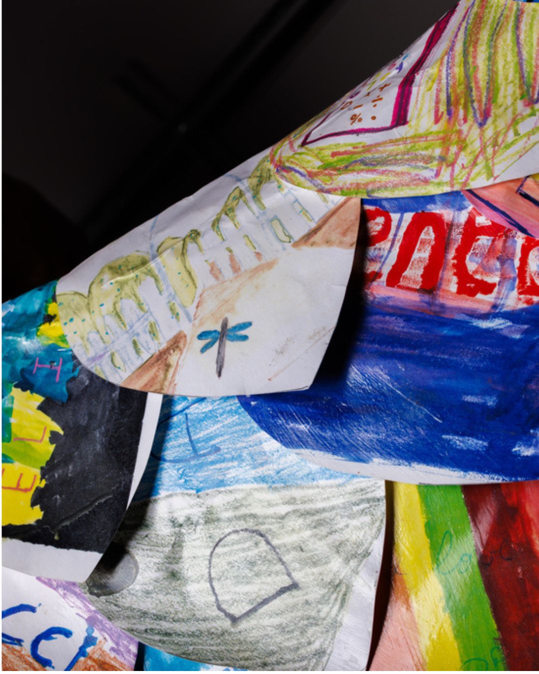 Paper "leaves" of the Phoenix displaying handwritten notes and artwork