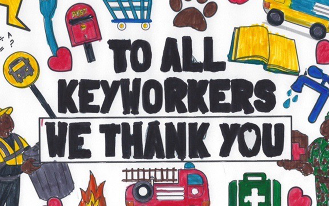  A hand-drawn poster reads "To All Keyworkers, We Thank You."   The slogan is surrounded by drawings of a sanitation worker, fire truck, a shopping cart,  medical instruments and other tools of fronline workers.   