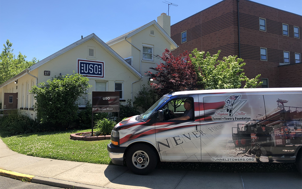 A truck from the USO, the nation’s leading organization to serve the men and women in the U.S. military, and their families, is parked outside an Amy facility on a sunny day  as masks were delivered to the frontline responders. 