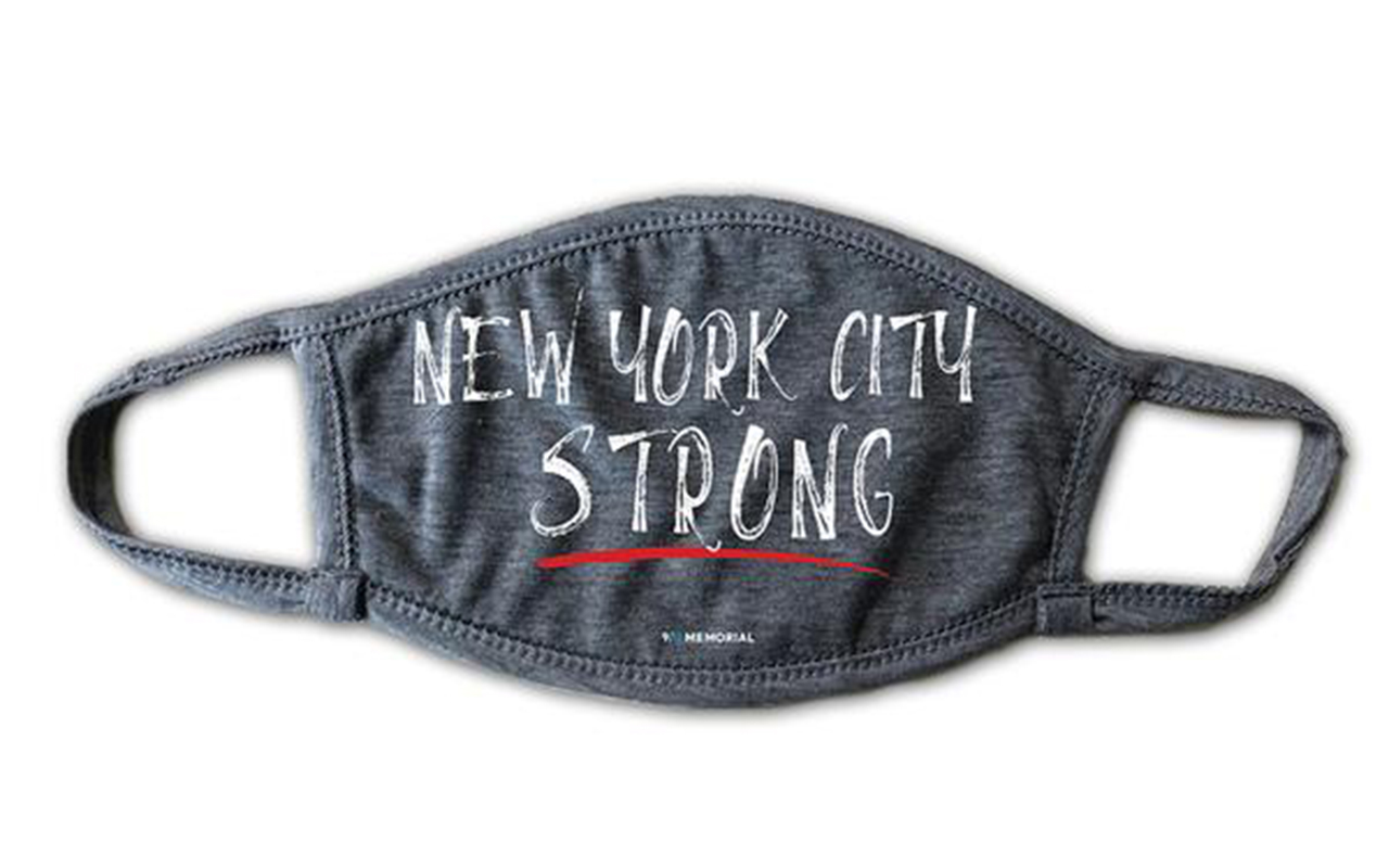 A grey face mask has the words" New York Strong" emblazoned on it in white with a red underline.  