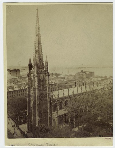 Antique photo of aerial view of the Trinity Church neo-Gothic steeple  dominating the sky.