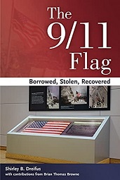 Book cover shows American flag on display at museum