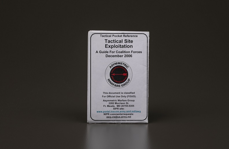 Folded guide titled Tactical Exploitation with a circular black and red logo in the center.