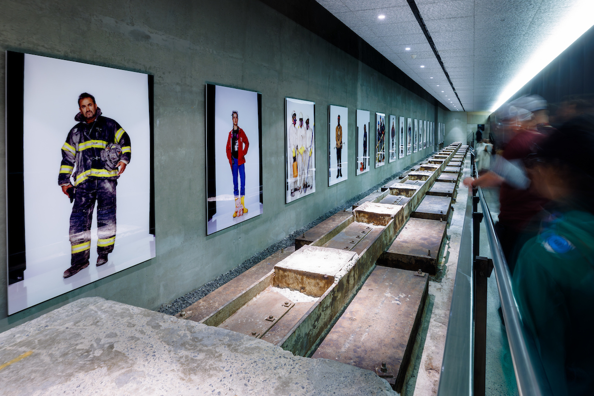 McNally Installation Hallway with visitors viewing the exhibit