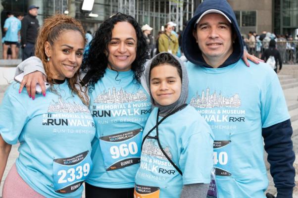 a group poses together in race t-shirts