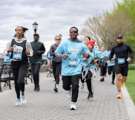 Runners in the race by the water