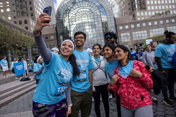 A group poses for a selfie before the 5K starts