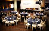 Wide lens shot of round tables set in the Atrium Lobby