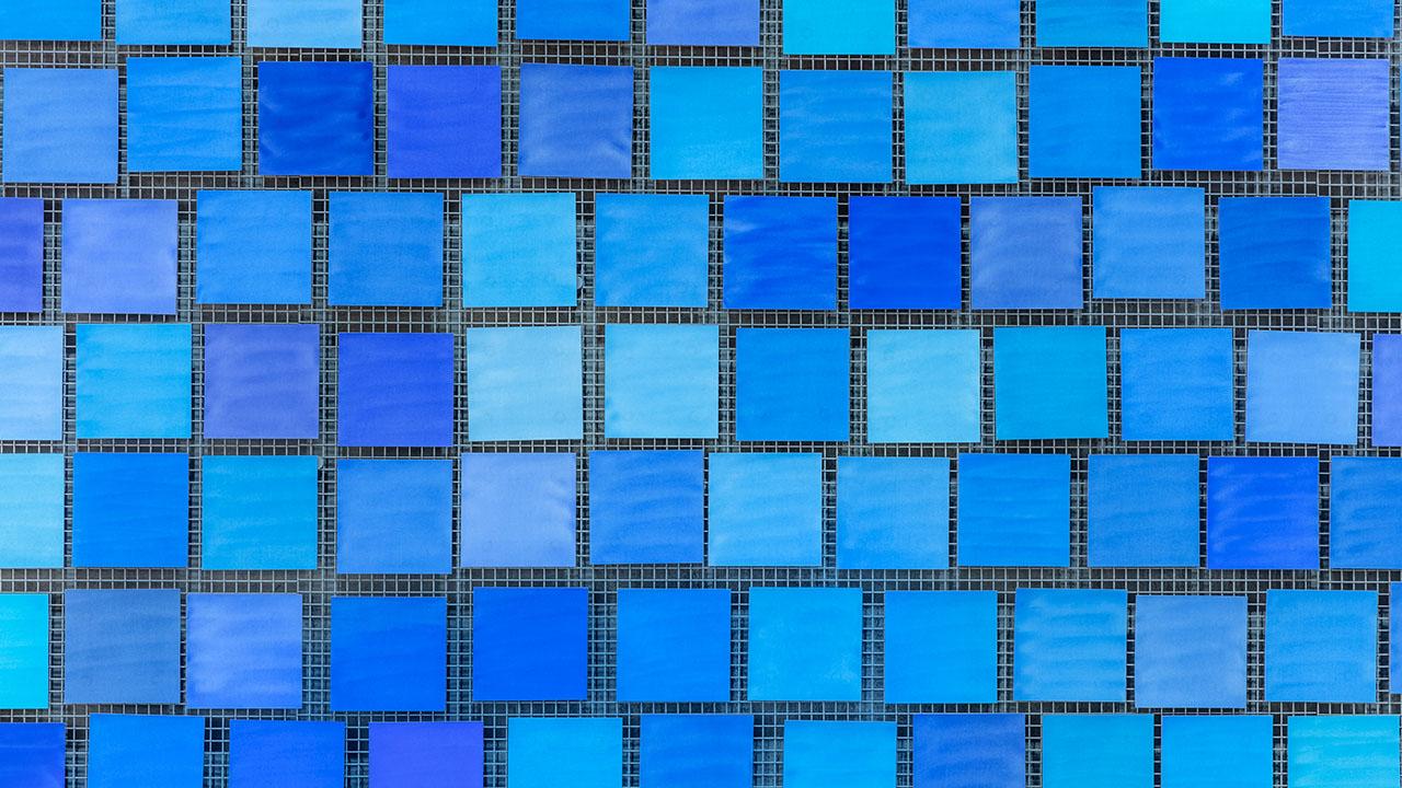 Tiles in different shades of blue from Museum installation