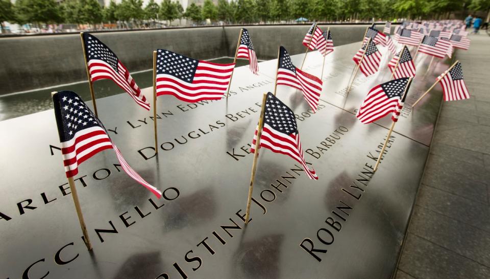 An array of American flags that were placed inside the names on the bronze parapets on the 9/11 Memorial.  